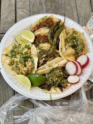 Assorted tacos: chicken, asada and carnitas. Carnitas is our favorite!!! Delicious tacos.