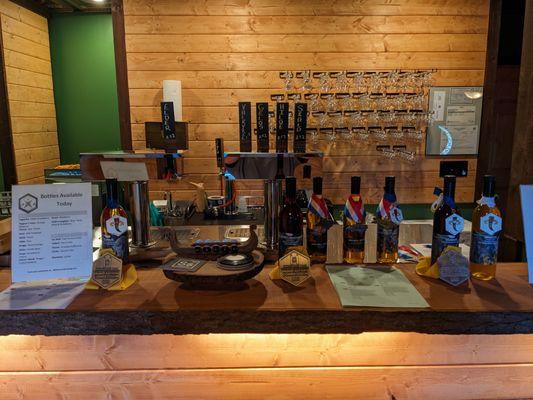 Bar and bottles with a small number of our 190 awards displayed.