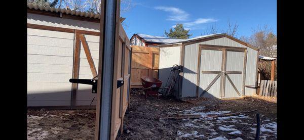 Side view of metal fence post.  Nice straight installation.