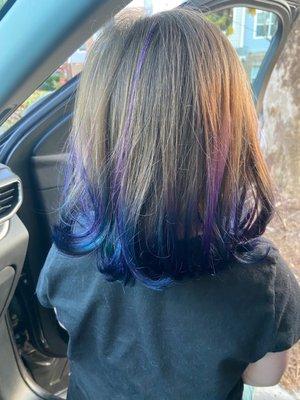 This is what they considered balayage. The strand of purple going down her hair is the sparkled strand they tied in.