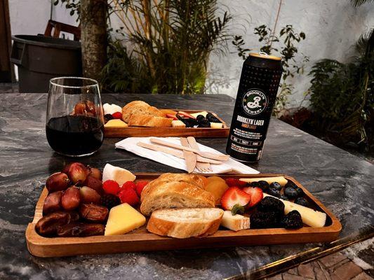 Glass of wine and lager with Charcuterie.