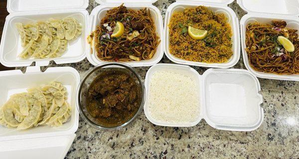 Left to Right: 2 Chicken Momo, 2 Chicken Chowmein, Chicken Biryani, Goat Curry, Basmati Rice