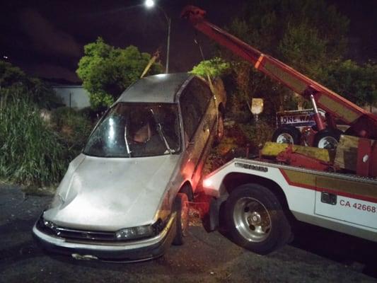 Lifting car off of sprinkler control valve after accident.