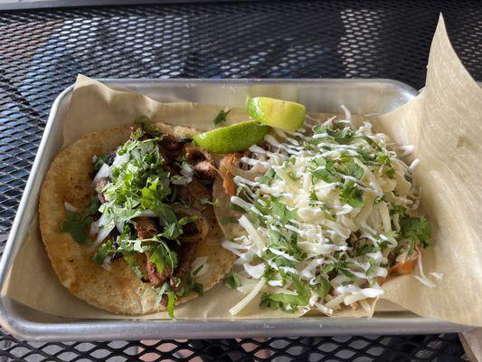 Machaca beef and a pork barbacoa tacos