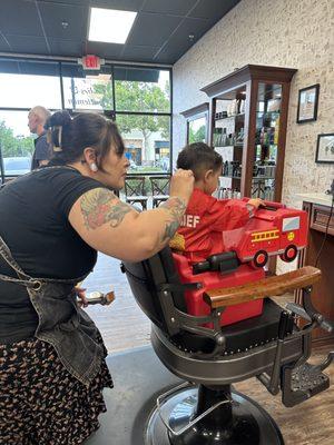 Shannon giving our 3-year old a haircut.