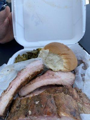 Rib platter with baked beans and collard greens