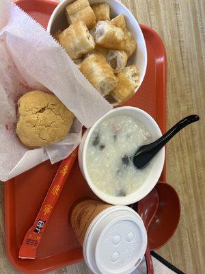 Chinese donuts, congee, Chinese bun, and coffee