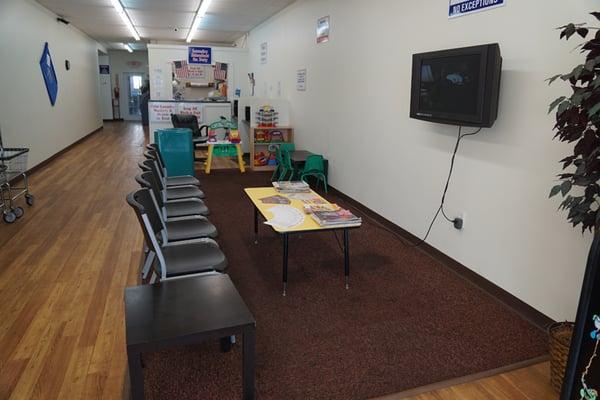 Reception area with TV, two computers, WiFi, snack machines. childrens' play area.