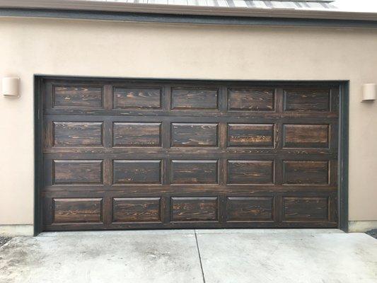 Check out this beautiful custom made wood overlay garage door we installed for a customer.