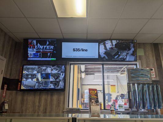 Lube center wait room, cameras to watch them work on your car