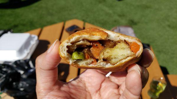 Interior of veggie samosa ($6), vegan by default. Too much oil in shell. Filling has little flavor. Meh.