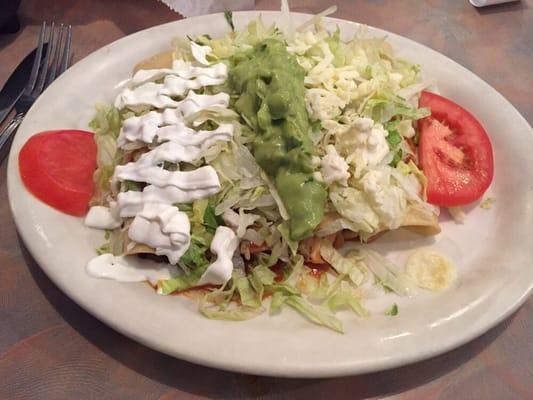 Enchiladas supremas. Chicken was tender, over a little bland though.