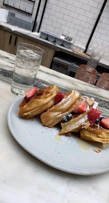 Their Belgian waffle served with fruit, syrup, and a lovely cinnamon (if I recall correctly) flavored butter.