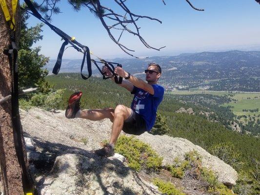 Performing a really exciting and gorgeous workout on the top of Bergen Peak, close to 10,000 ft in elevation. This beats a gym any day!