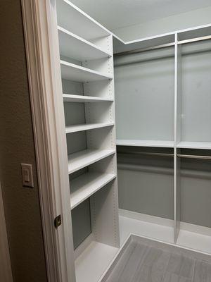 Walk in closet with more shelving