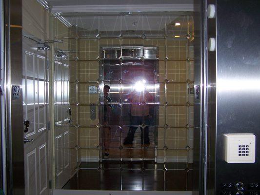 Mirror tiles in elevator