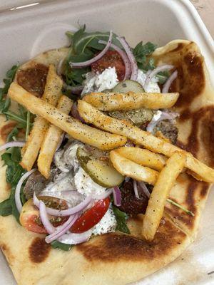 Lamb gyro with fries and pickles