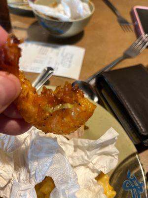 Shrimp with shell and all feet fully attached.