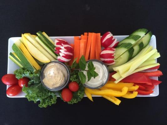 Zucchini, Yellow Squash, Red and Yellow Bell Peppers, Tomatoes, Radishes, and Cucumbers served with Hummus and Buttermilk Ran...