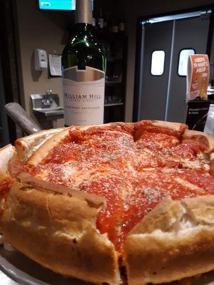 Stuffed Pizza with a bottle of cab!