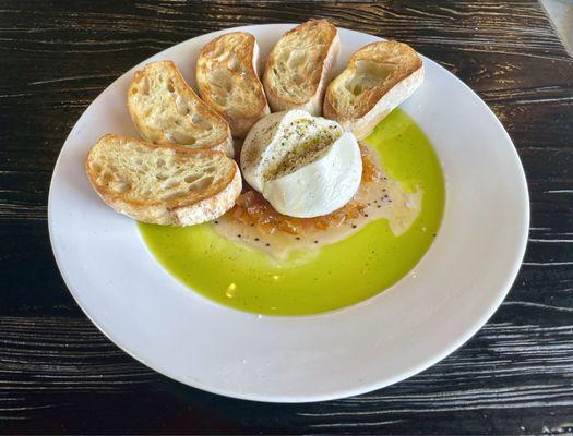 Bufula di burrata with pear mostarda, buttered toast, and basil oil