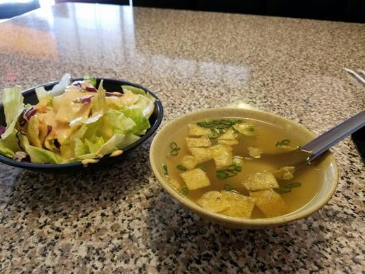 Soup with crispy wontons and green onion and lettuce salad with ginger dressing.  Very good!