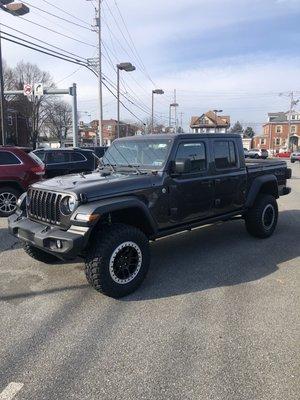 2020 Jeep Gladiator with MOPAR 2 inch lift, upgraded wheels and tires, and MOPAR rock rails!