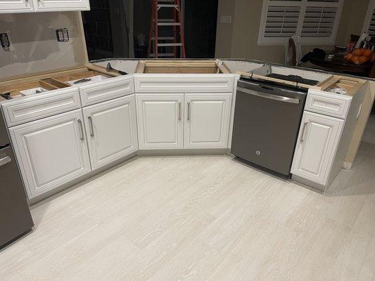 Nearly complete kitchen, waiting for countertops to be installed