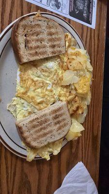 Omelette, toast and potatoes