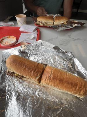 Philly cheesesteak w/ provolone & chicken cheesesteak w/provolone.