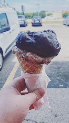 Waffle cone with a scoop of salted caramel brownie and hazelnut heaven