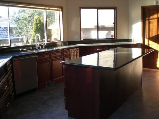 Tacoma kitchen Remodel.  New cabinets, granite counter tops, and tile flooring