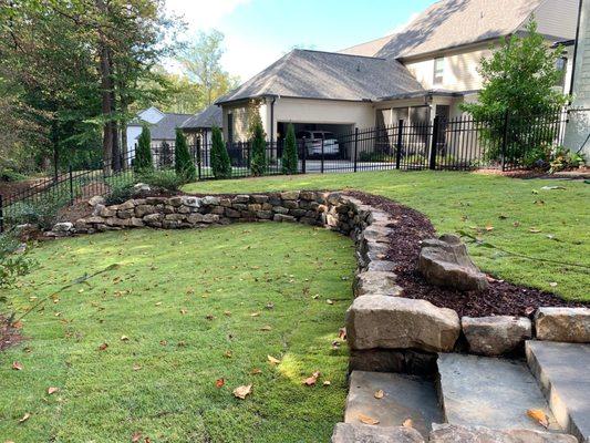 Boulder Wall, Zoysia Sod, Stone Step Treads