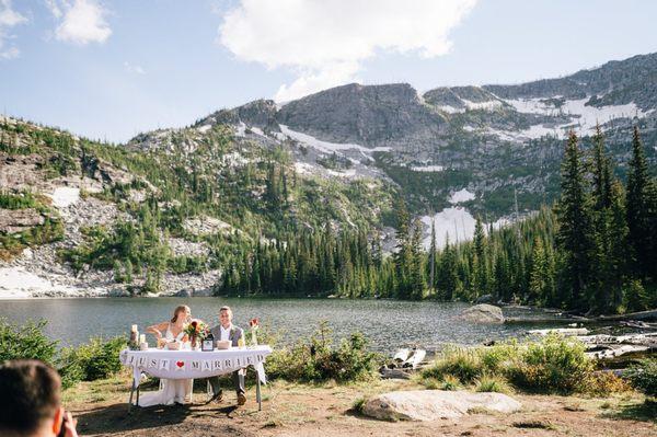 Sweet heart table up on a local mountain lake for a destination/adventure wedding