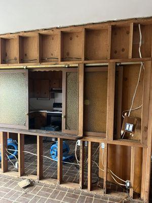 Removed wood paneling in an entire room from top to bottom