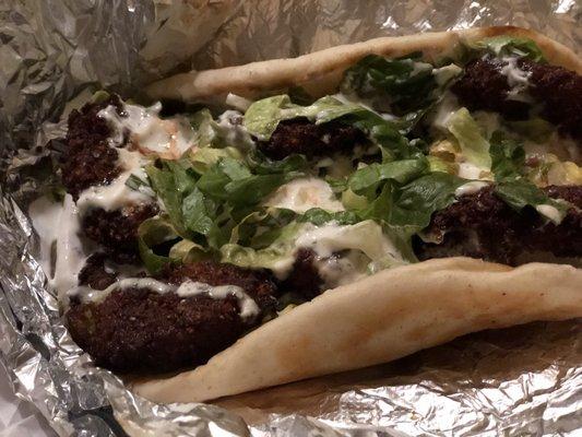 Falafel on Pita with extra white sauce.