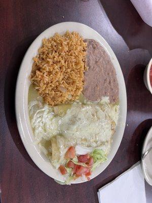 Shrimp enchiladas with green sauce on top - delicious!