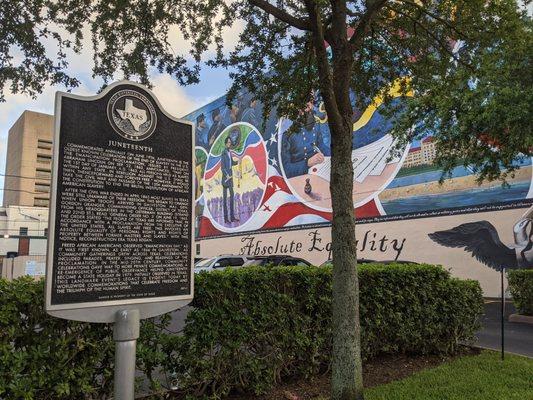 Juneteenth historic marker and "Absolutely Equality" mural by Reginald C. Adams