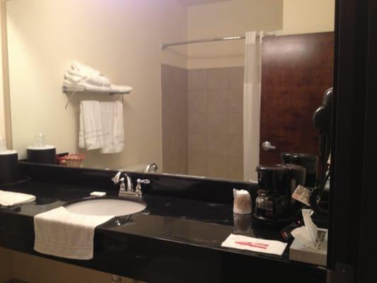 The restroom had a little coffee maker and a blow dryer. The hardware was new looking.