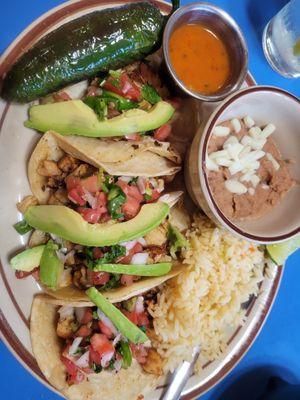 Fish tacos; beautiful!  But BEWARE of the nuclear-hot sauce!