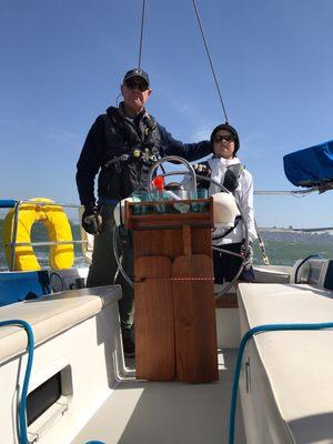 My son learning to sail with Captain Bob.