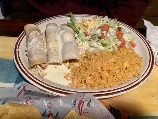 Chicken enchiladas with white queso.