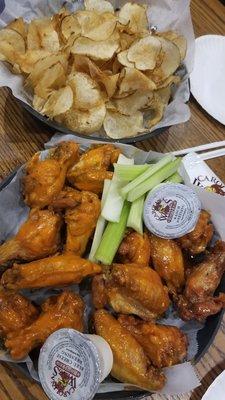 A mix of sriracha and Fire Island wings. They were both delicious. Crispy fries made in house, crisp and crunchy without being too greasy.