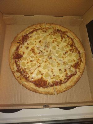 LARGE pineapple pizza.  Looks like a small pizza, right?