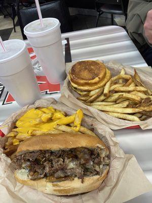 Texas Philly Cheesesteak Sandwich and Cheese Fries / Mushroom Shroom Burger 8oz Burger and Cajun Fries