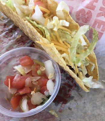 Regular crispy taco and pico de gallo from condiment bar.