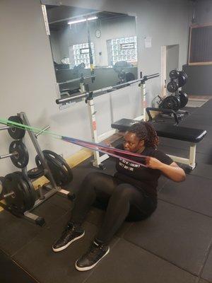 Kim crushing some banded pulldowns.