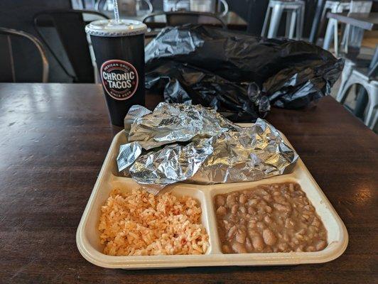 Carne Asada Taco Plate having Spanish Rice and Refried Beans