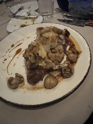 Delmonico steak with gorgonzola, onions and mishrooms