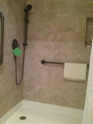 A shower in a one-bedroom room